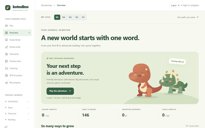 Kotodino capture: the English home page, “A new world starts with one word”, with the dinosaurs Momo and Hana.